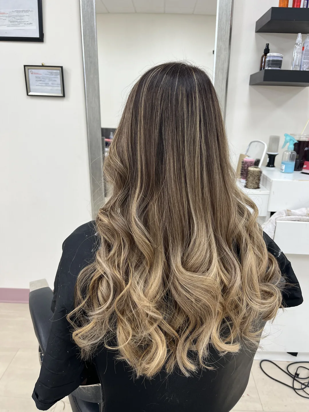 bronde balayage with curled ends salon mirror