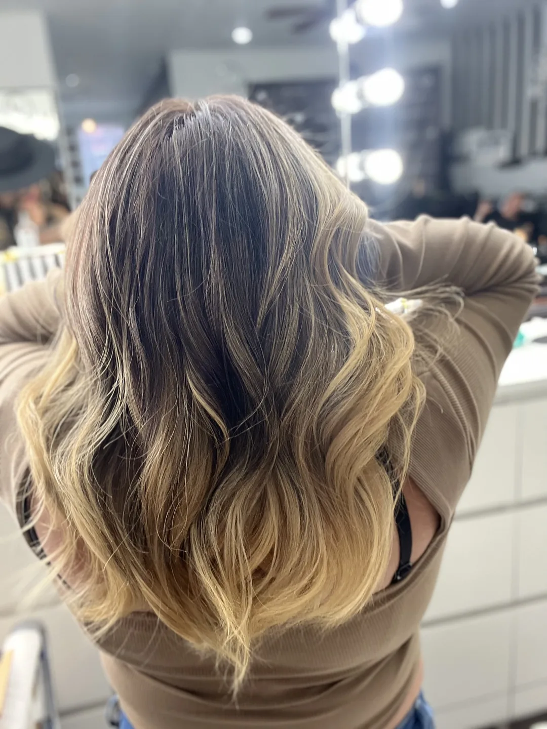 brunette-to-honey ombre balayage long waves