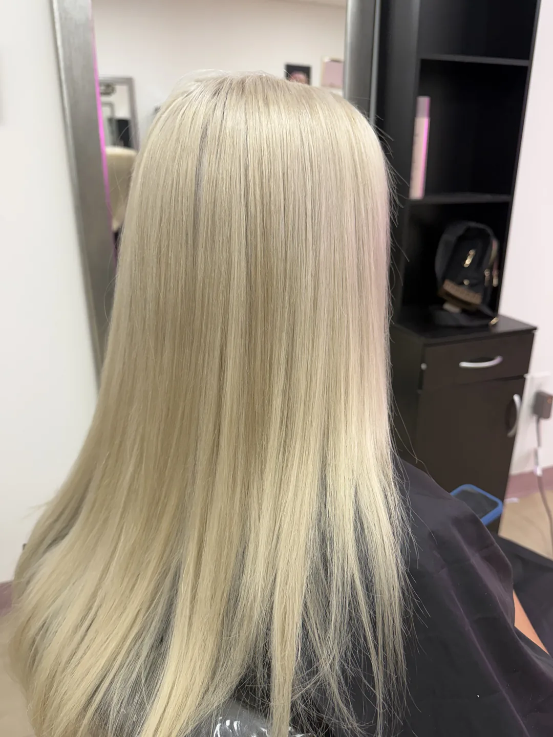 icy platinum blonde on long straight hair, back view