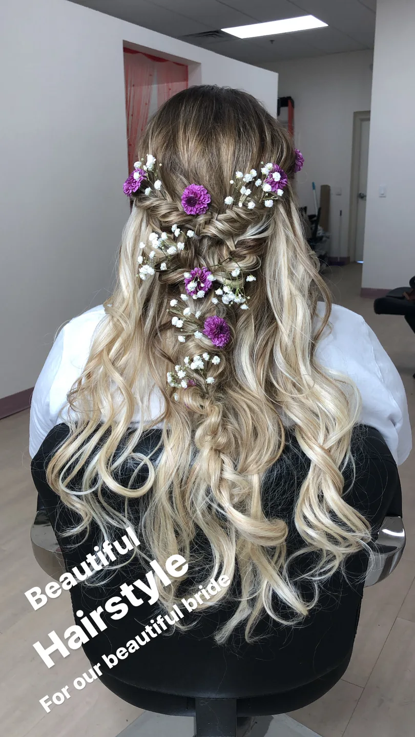 bridal half-up braid with purple & baby's breath florals