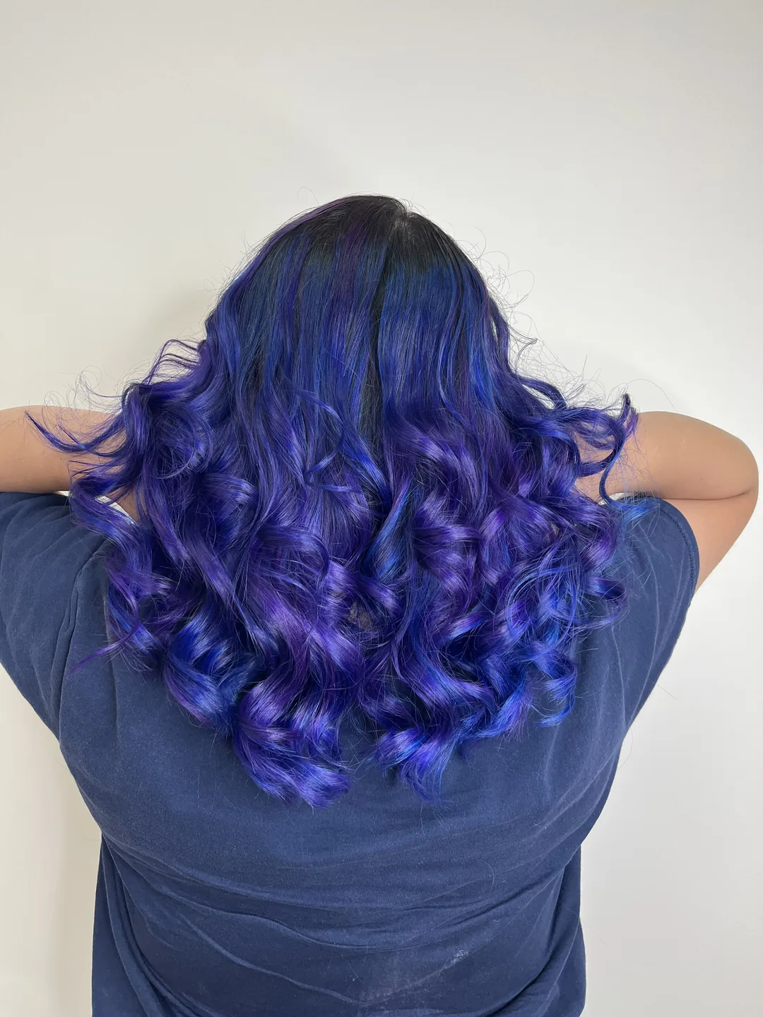 vivid purple-and-blue curled mermaid color