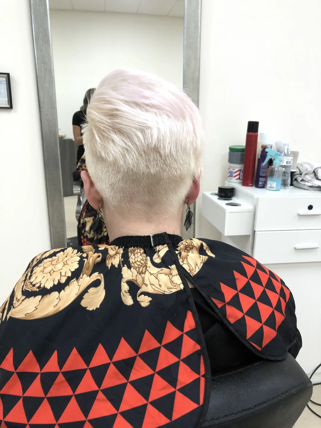 pastel-pink platinum pixie cut back-view
