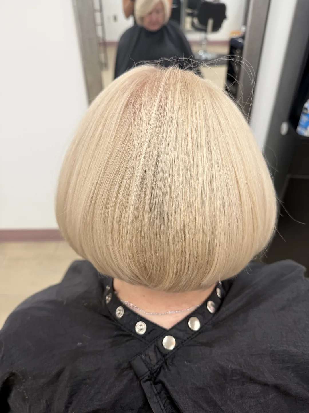 polished platinum blonde chin-length bob, back view